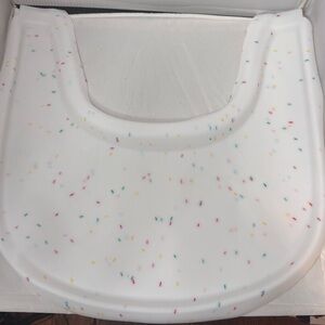 New in packaging, White Sprinkle Patterned baby hichair, silicone placemat.